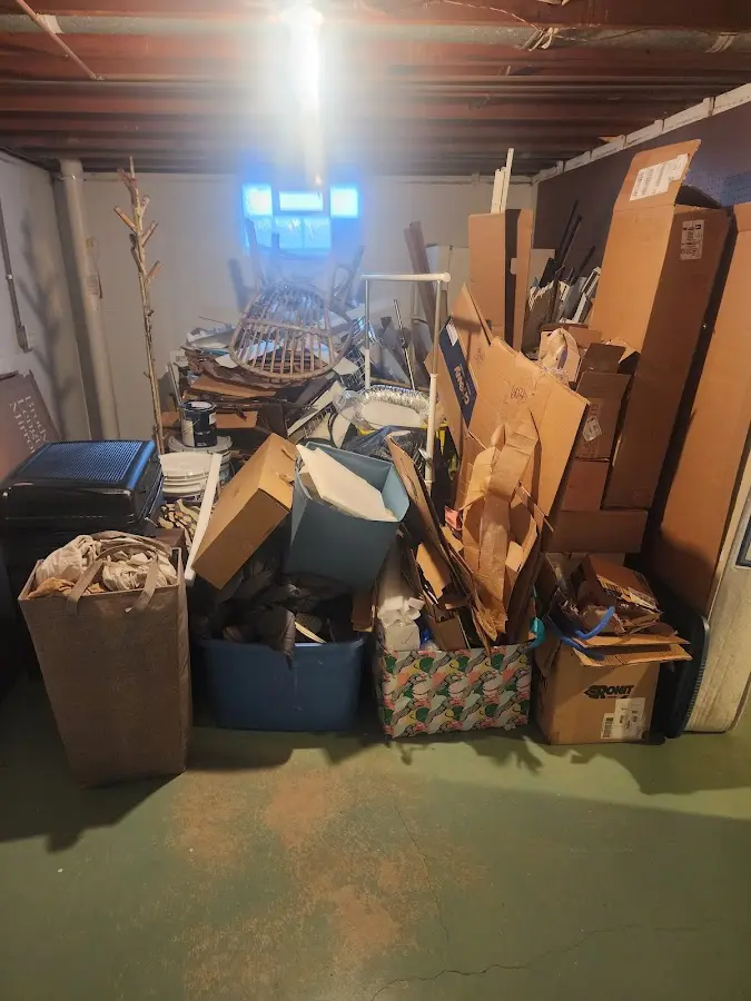 Roll-off dumpster container at job site for 15 Yard Dumpster Rental in Athol